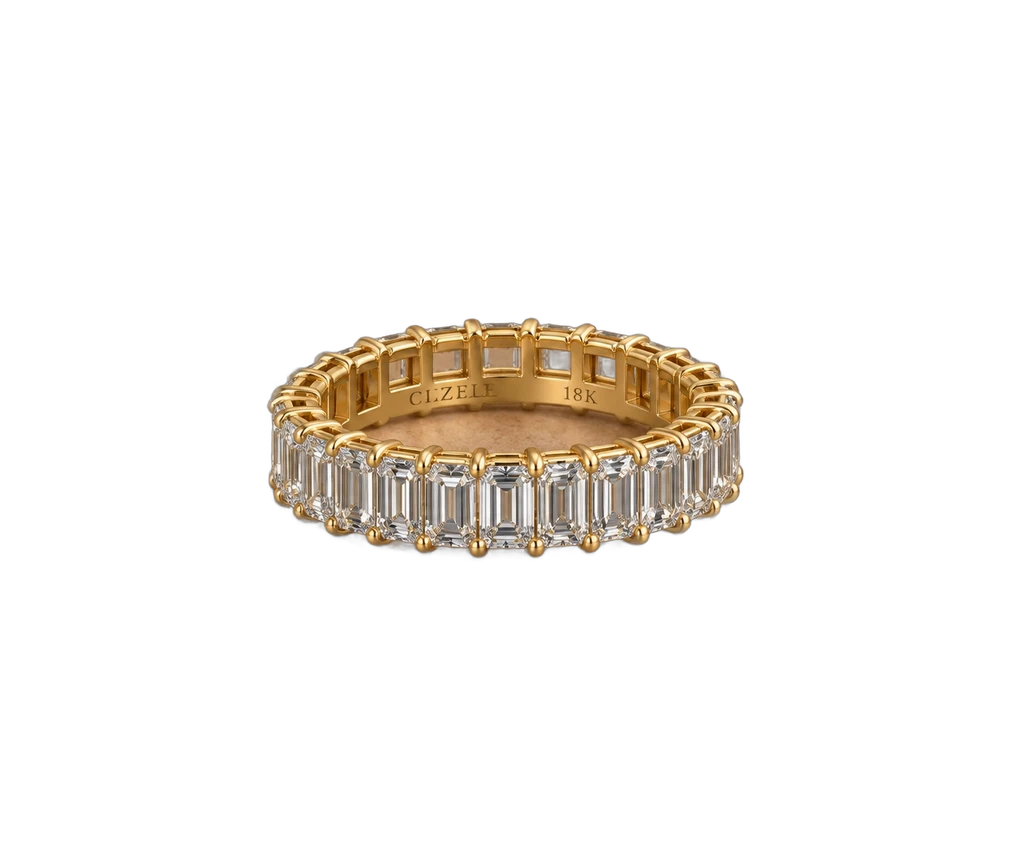 Baguette diamond wedding band in emerald cut , worn on the hand